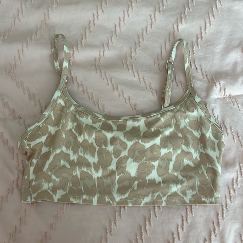 Too small for me now, really cute top could pair with white bottoms!